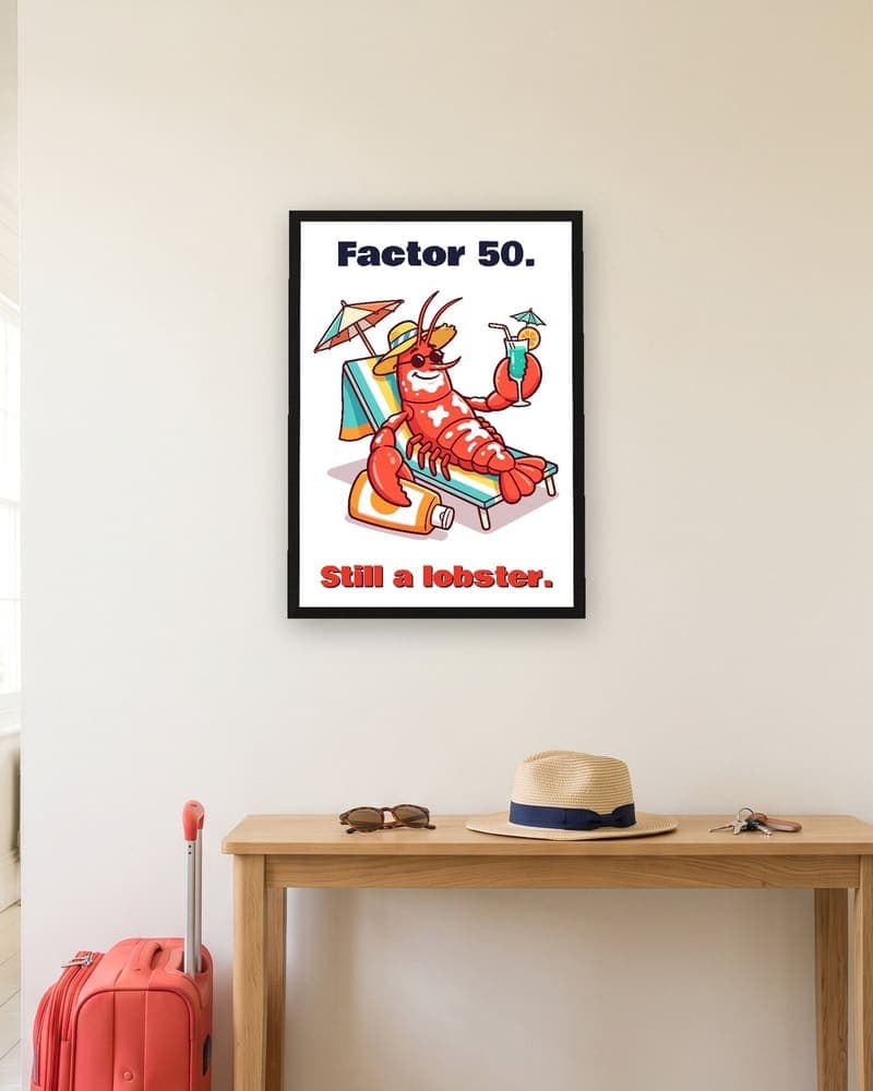 Factor 50. Still a lobster. print: a cheerful cartoon lobster in a straw hat and sunglasses lounging on a striped sun lounger, cocktail in claw, splodged with sun cream and bright red anyway, with the words in bold navy and red on white. Shown framed in black, oak or white, unframed, unboxed and as a phone wallpaper.